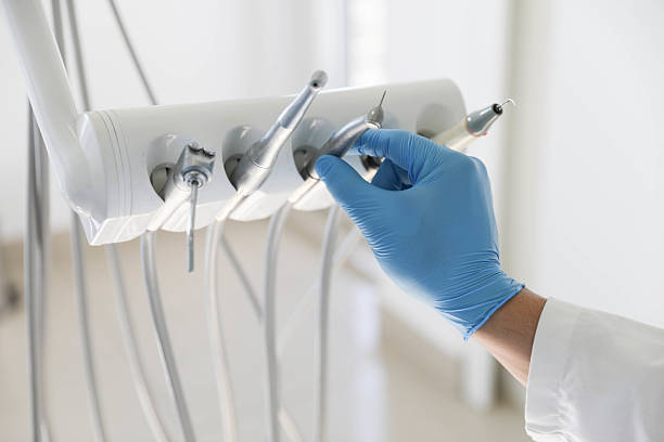 Professional Tooth Extraction technician working in Warrenton, OR